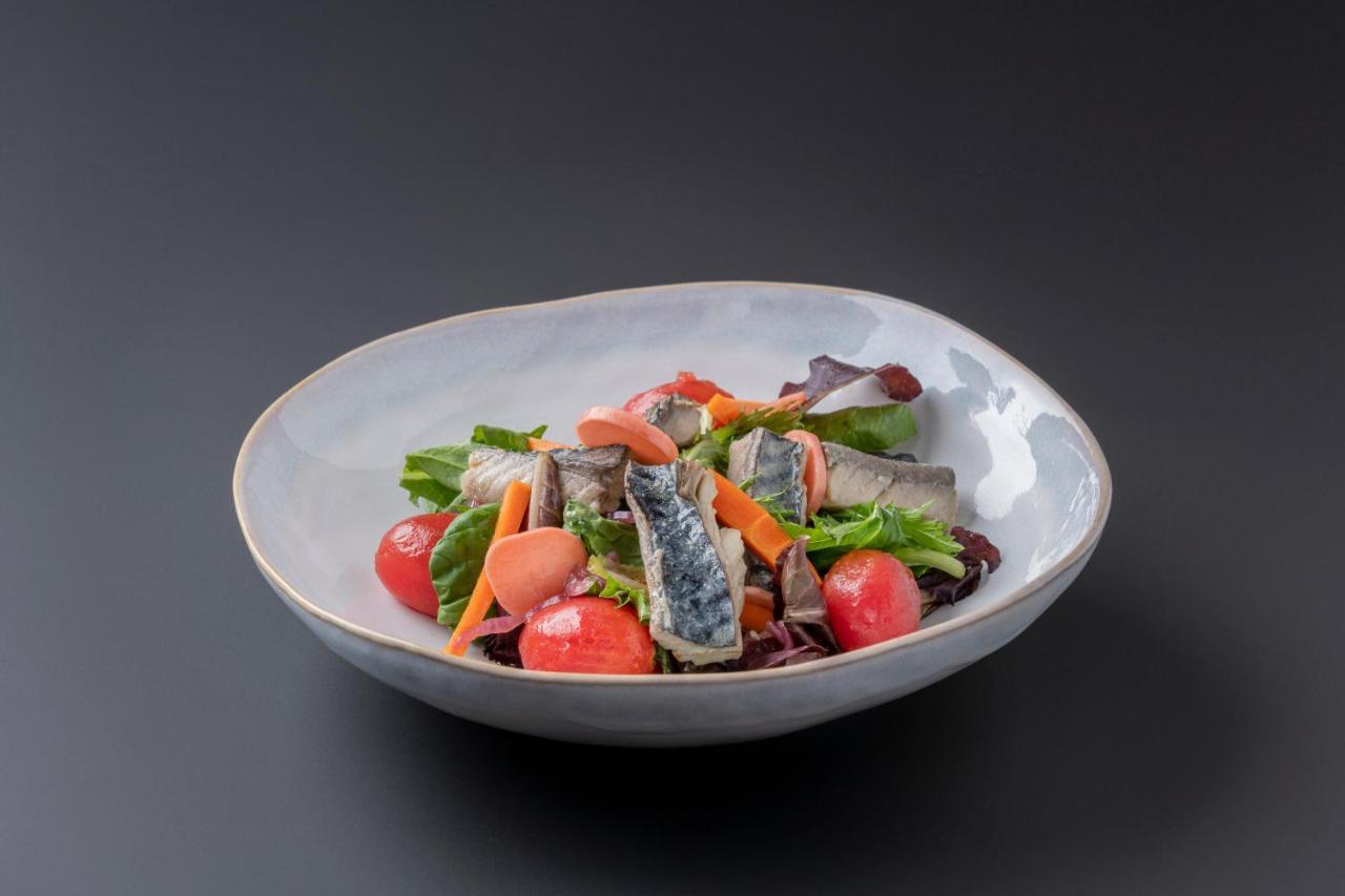 Eurostars Portico Alicante Eksteriør billede A salad with sardines